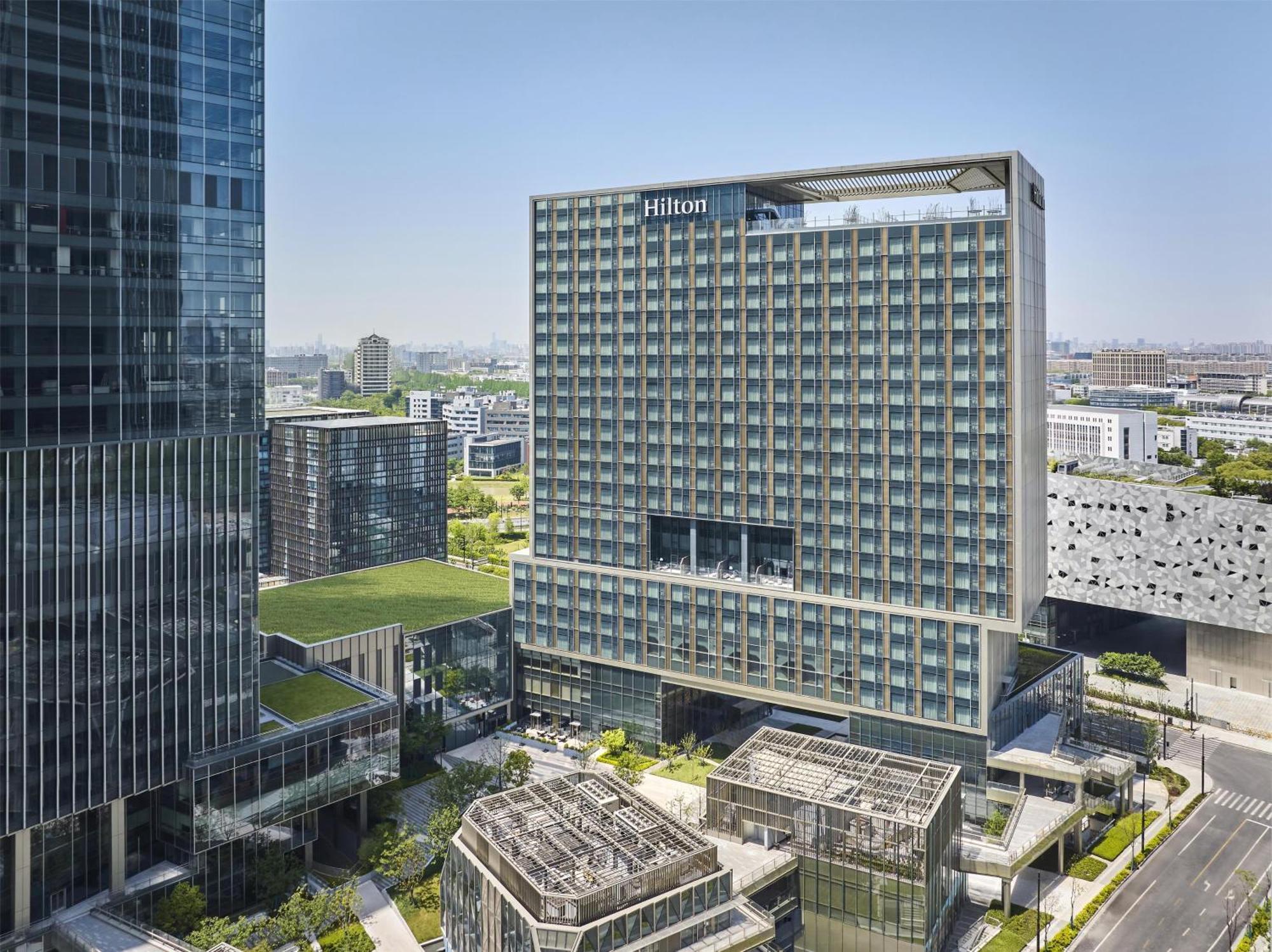 Hotel Hilton Zhangjiang Science - Shuttle Bus To And New International Expo Centre During Exhibition Period And 30 Minutes Drive To Pvg Shanghai